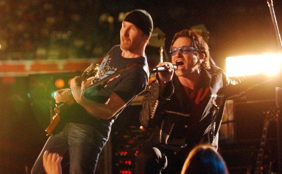 Bono performs during the halftime show at Super Bowl XXXVI.
