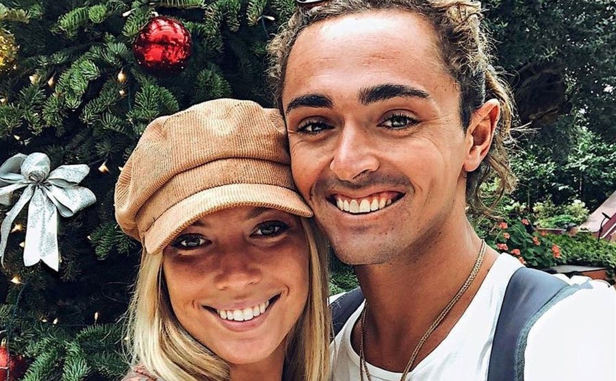 An outdoors portrait of Jenna Bowman and Sebastian Noel.