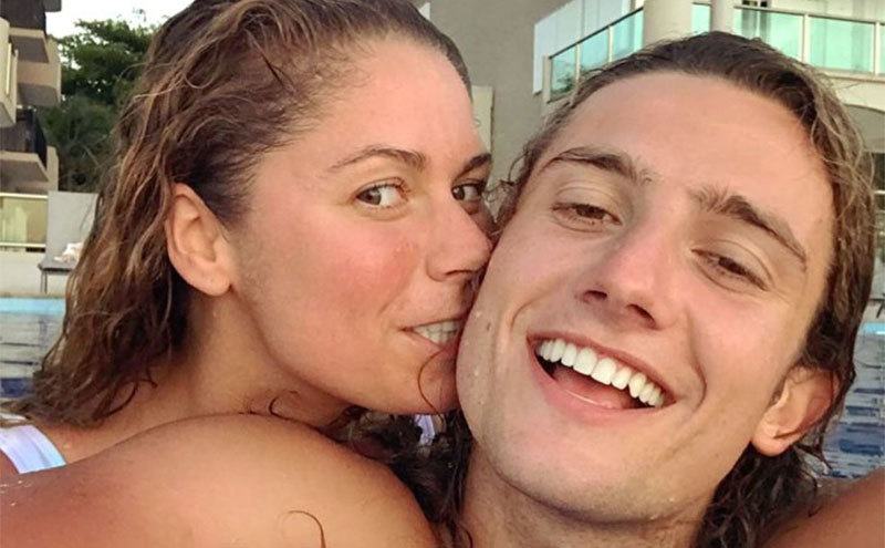 A picture of Elizabeth and Jack by the swimming pool.