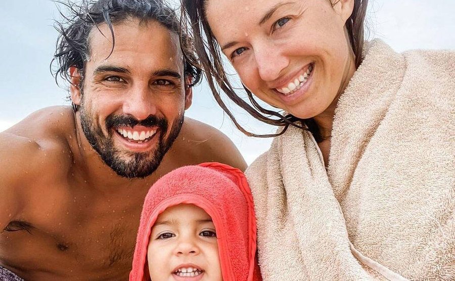A photo of Parvati, Jon, and their daughter.