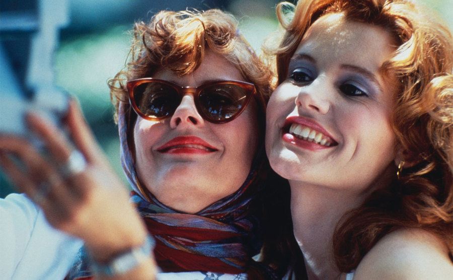 Susan Sarandon and Geena Davis take a picture in 'Thelma And Louise' with their polaroid camera.