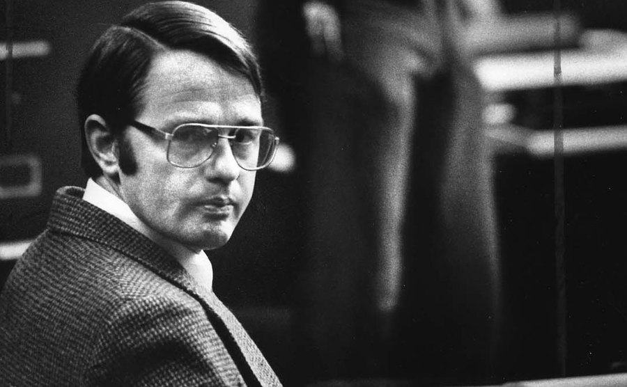 A picture of Cameron sitting in court.