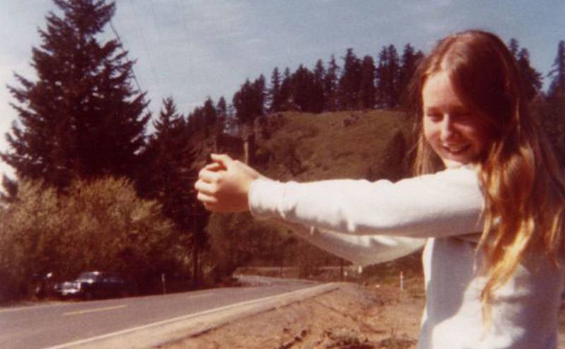 A dated photo of Colleen by the road.