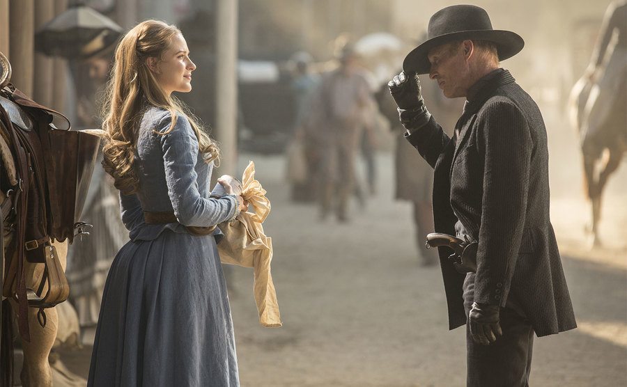 Evan Rachel Wood and Ed Harris greet each other in a scene from Westworld.