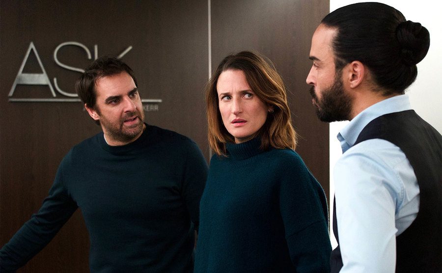 Grégory Montel, Camille Cottin, and Assaad Bouab in a still from the show.