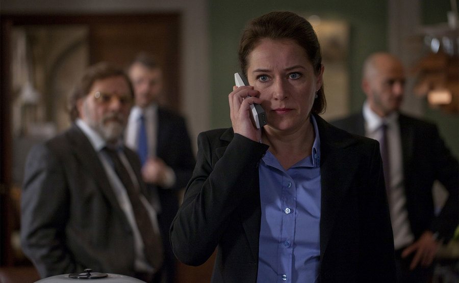 Sidse Babett Knudsen talks on the phone in a still from Borgen.