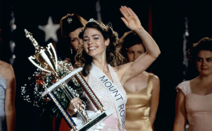 Denise Richards waves in a scene from Drop Dead Gorgeous.