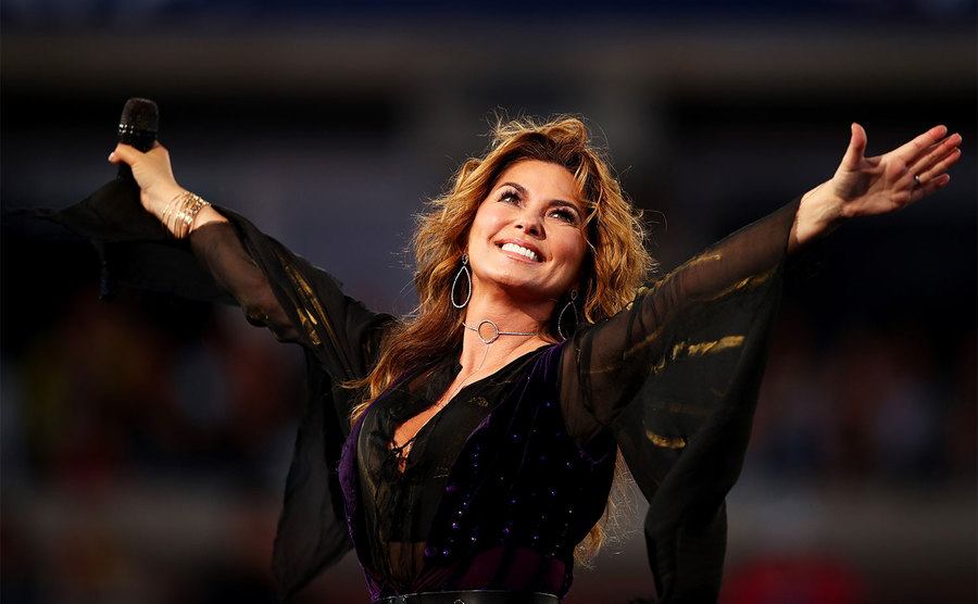 Shania Twain performs on stage.