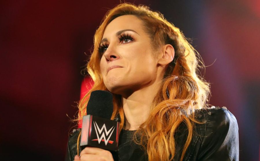 Becky Lynch speaks during a WWE event.