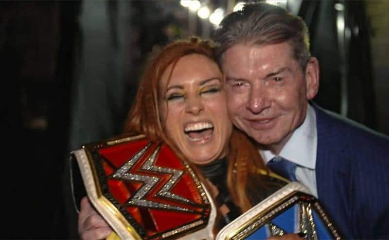 A photo of Vince McMahon with Becky Lynch