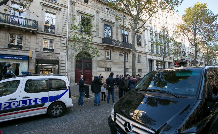 A police car waits outside Kim Kardashian's apartment.