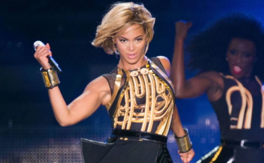 Beyonce performs on stage.