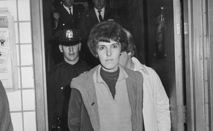 Valeria Solanas arrives at a Manhattan precinct house.