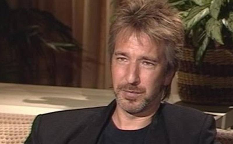 A still of Alan Rickman during an interview.