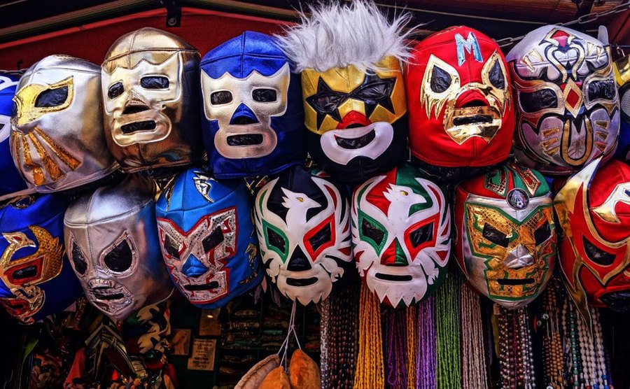 A photo of Mexican wrestling masks on display.