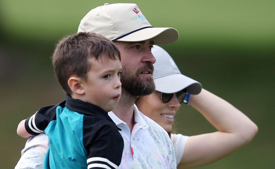 Justin Timberlake holds his son Silas next to Jessica Biel.
