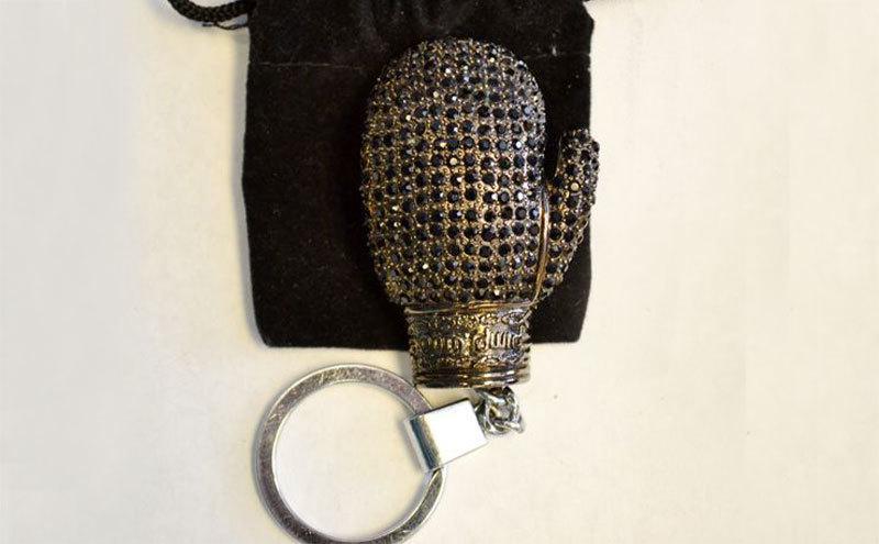 An image of a boxing glove with black stone owned by Lulu.