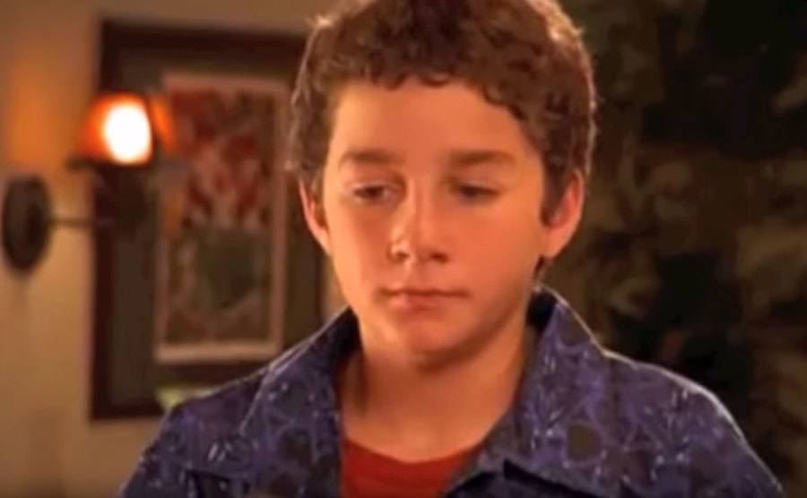 A disappointed-looking Shia LaBeouf in a still from a TV show. 
