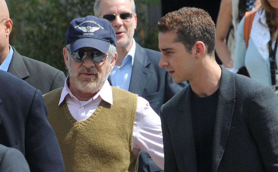 Steven Spielberg and Shia LaBeouf have a private conversation. 