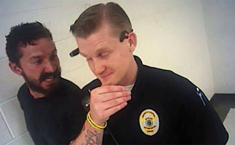 LaBeouf is yelling at a police officer. 