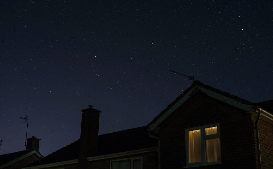 An exterior shot of a house at night.