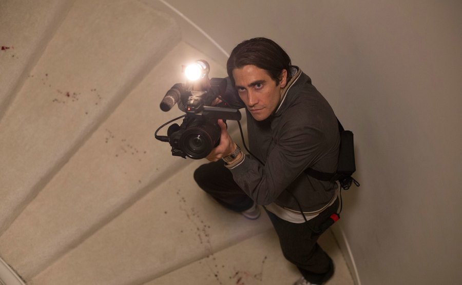 Gyllenhaal walks up the stairs in a scene from Nightcrawler.