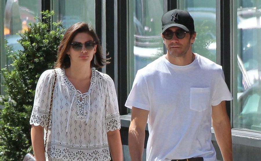 Jake Gyllenhaal and Alyssa Miller are seen walking the street.