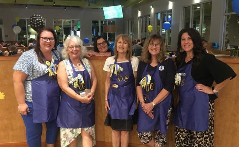 A portrait of the cafeteria staff.
