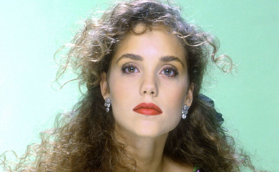 A dated studio portrait of Elizabeth Berkley.