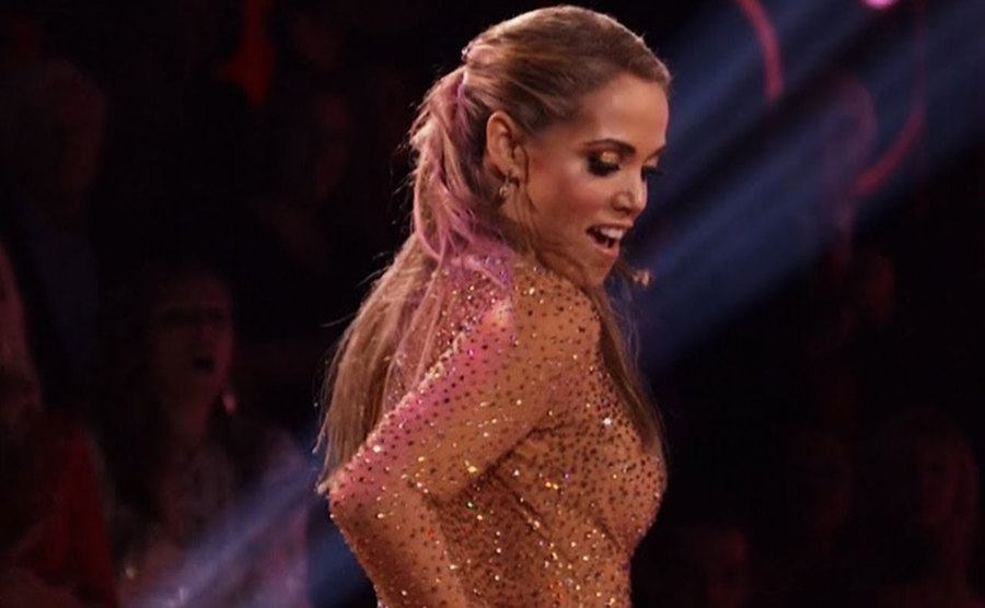Berkley dances on stage.