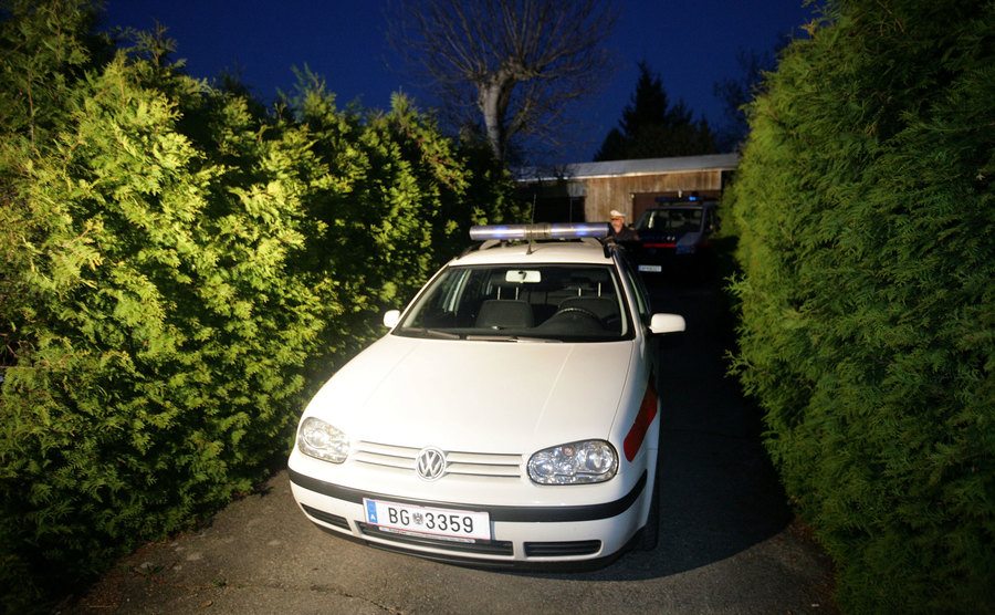 A police car is parked outside the Fritzl home.