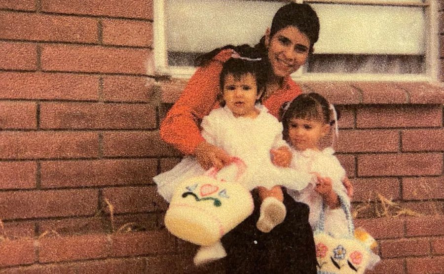 A resident of Hinkley, is pictured with her children in 1981.
