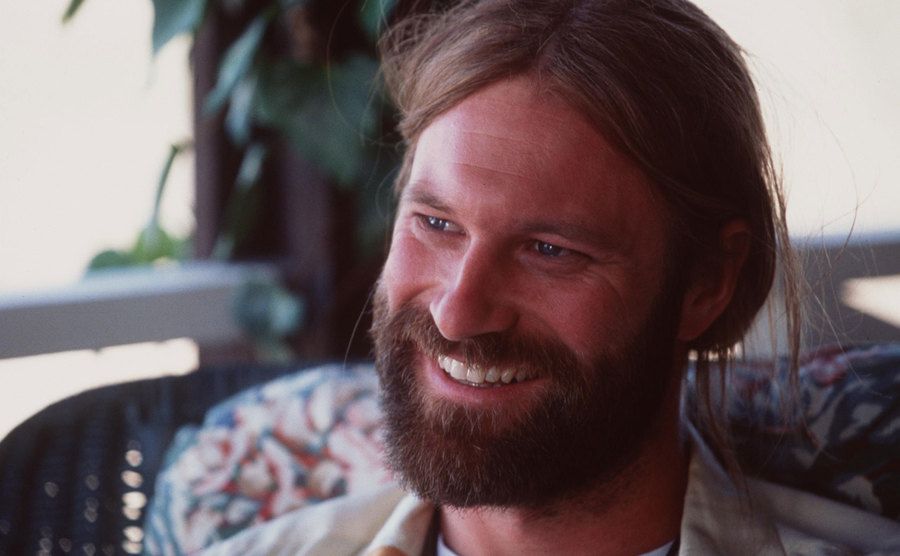 A portrait of Aaron Eckhart as George.
