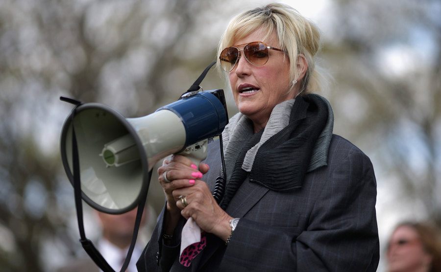 A photo of Erin during a rally.
