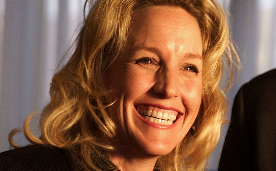 A portrait of Erin smiling.