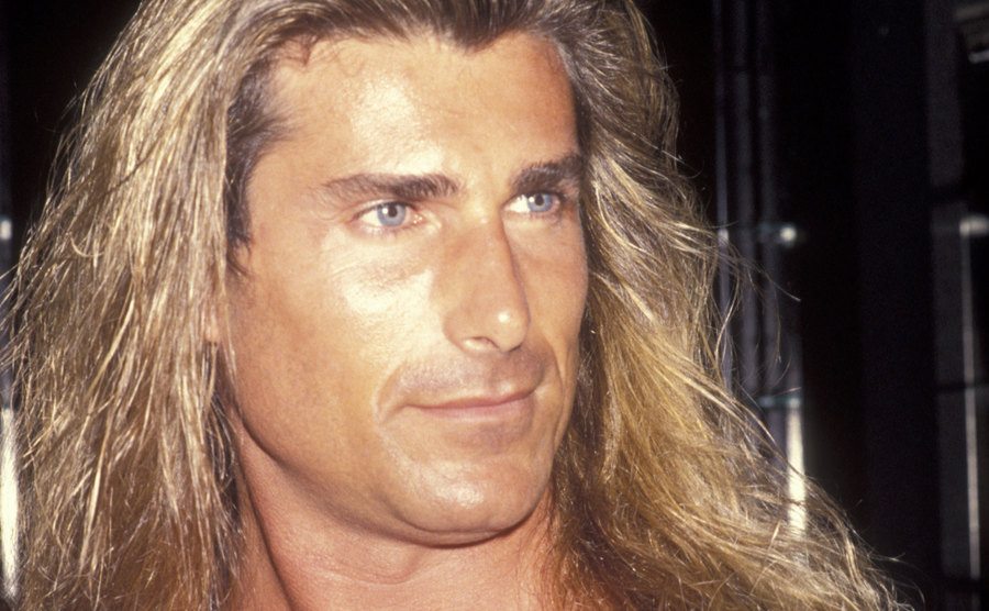 A dated portrait of Fabio during an event.