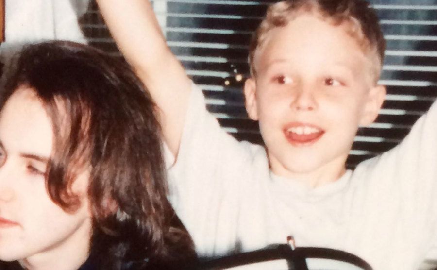 A dated picture of Josh with his big brother.