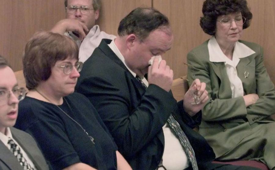 Josh Phillips's father, Steve Phillips, wipes away a tear during the trial.