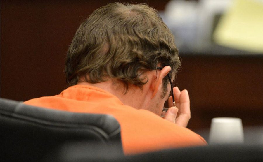 A picture of Josh sitting in court.