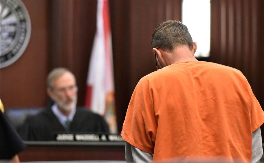 An image of Josh standing in court.