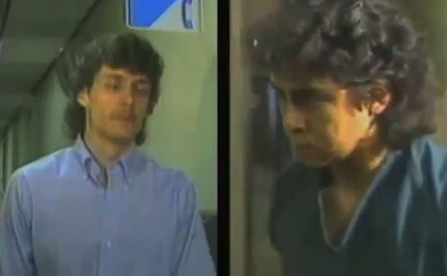 A picture of Danziger and Ochoa escorted by police.