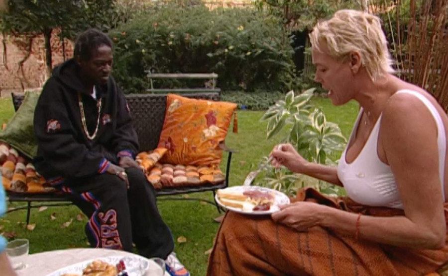 A still from Flav and Nielsen in a scene in the garden.