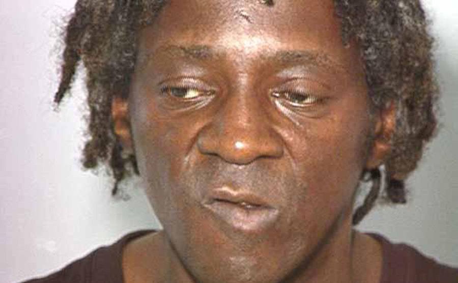 A mugshot of Flavor Flav.
