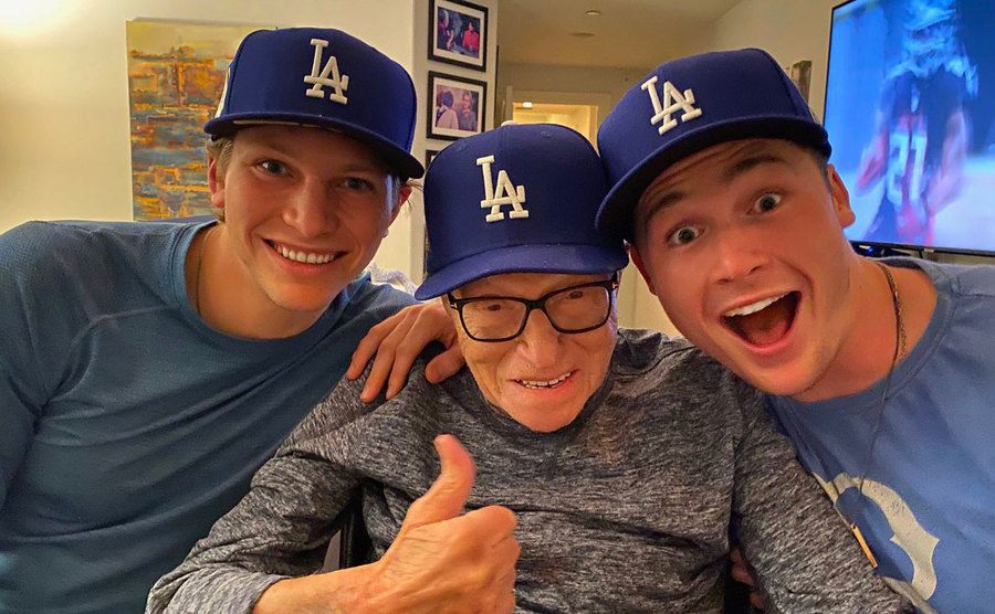 Larry King’s photo with his sons.