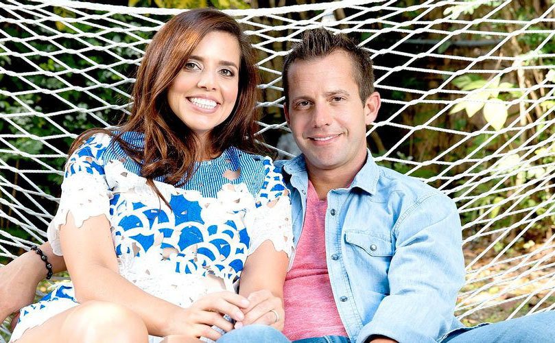 Sonia Granados and Nick Pendergrast share a hammock.