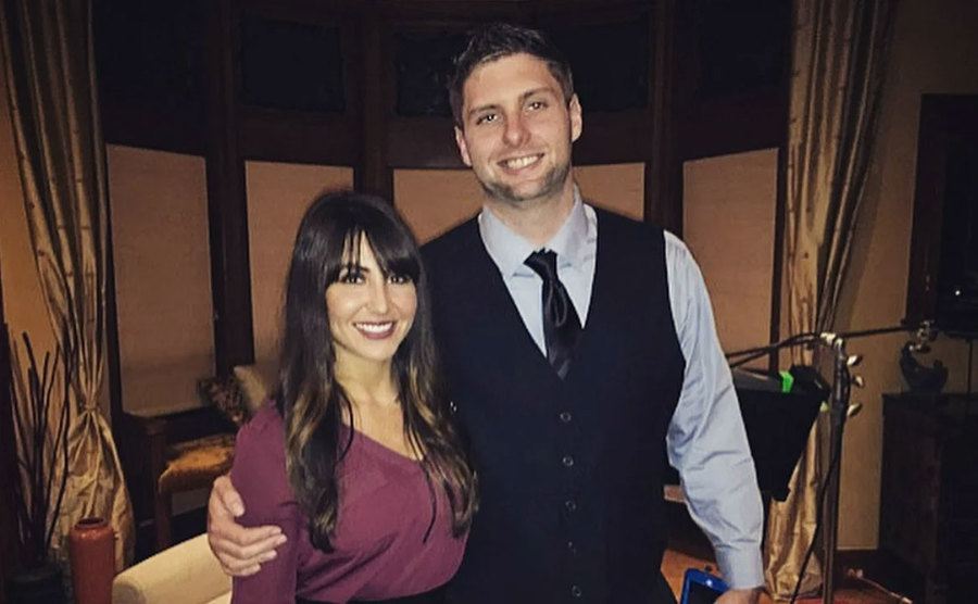 Cody Knapek and Danielle DeGroot are at an event.