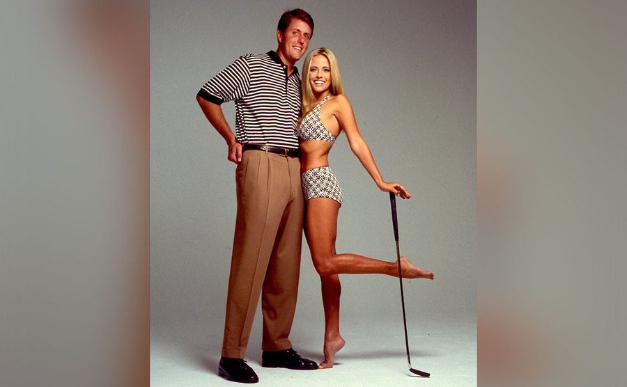 Phil and Amy Mickelson pose together.