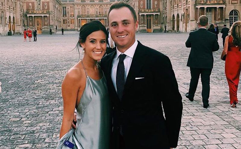 Justin Thomas and Jillian Wisniewski pose for a photo.