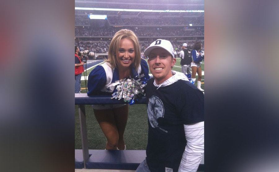 Hunter visits Kandi while she is cheering at a game.
