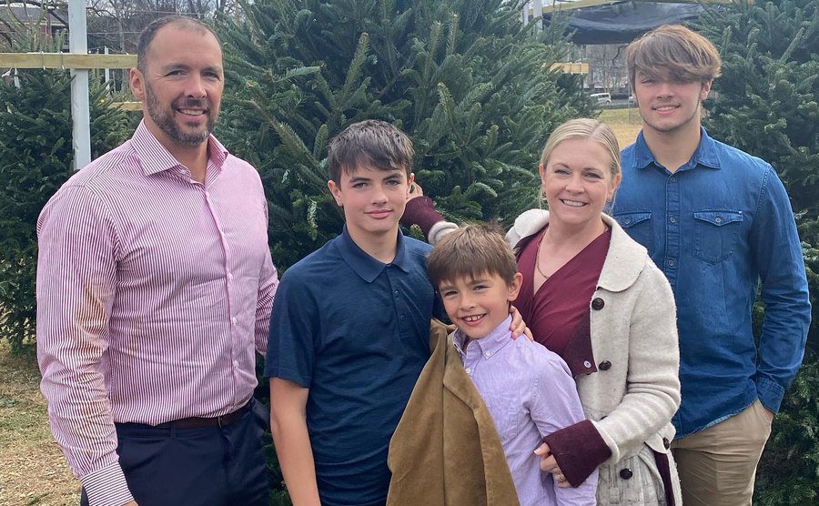 Hart and her family are out picking Christmas trees.